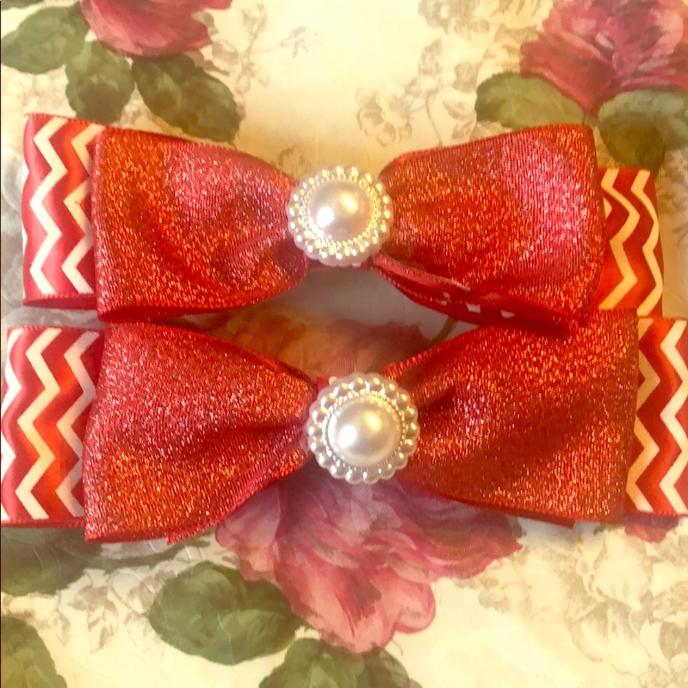 A set of red and red and white stripe hair clip